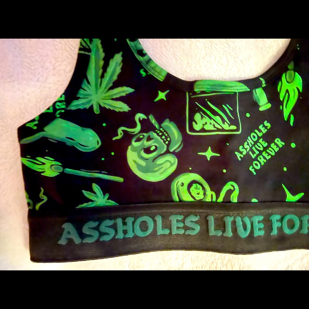 assholes live forever sports bra